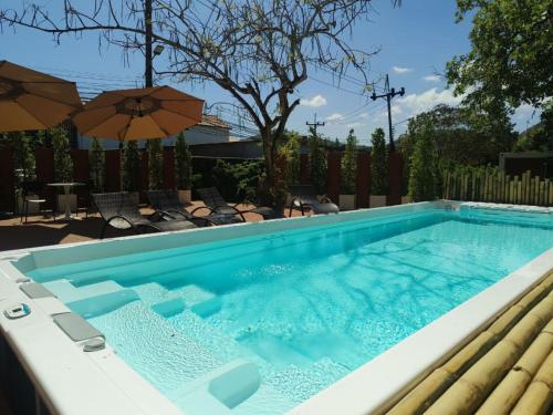 Swimming pool, NeOtel Apartments in Nai Harn Beach