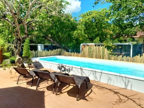 Swimming pool, NeOtel Apartments in Nai Harn Beach