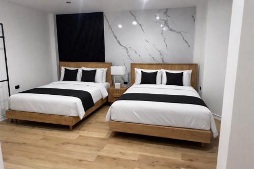The Hive Boutique Hotel Double Queen Room 106 in Scarborough