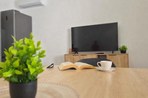 Közös társalgó / TV, Casa MAJA in Arbatax