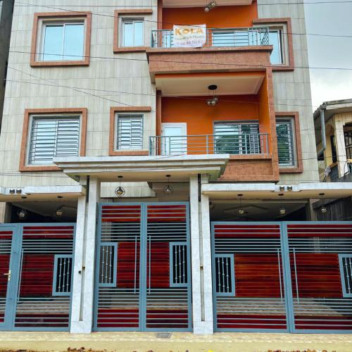 Exterior view of Meubles tout confort a Makepe - Immeuble KOLA - Groupe Electrogene