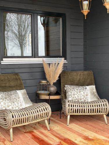  Landelijk gelegen houten huisje in Opperdoes