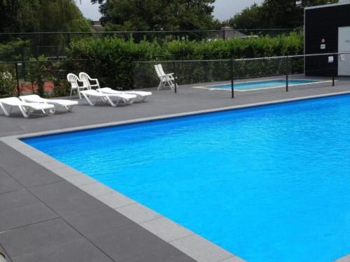 Holiday Home Schone Ferienhaus in einem familienfreundlichen Ferienpark mit gemeinschaftlich by Inte in Tholen