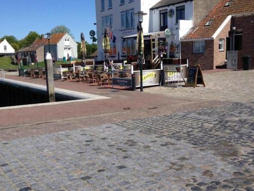 Holiday Home Schone Ferienhaus in einem familienfreundlichen Ferienpark mit gemeinschaftlich by Inte in Tholen