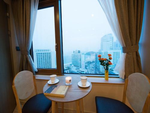 Haeundae Marianne Hotel Stop at Haeundae Marianne Hotel to discover the wonders of Busan. The property offers a high standard of service and amenities to suit the individual needs of all travelers. Service-minded staff will 