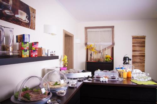 Food and beverages, Garni-Hotel An der Weide in Hellersdorf