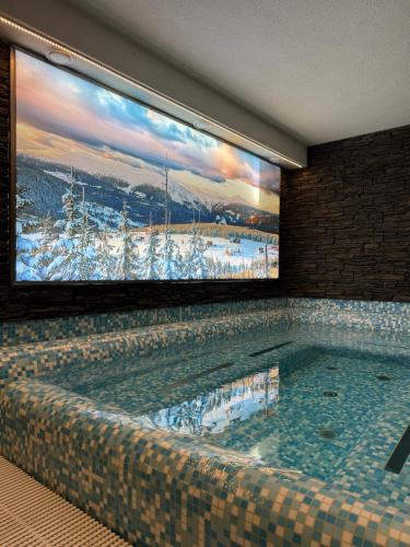 Hotel Vydrovy boudy, Pec pod Sněžkou (Hotel Vydrovy boudy, Pec pod Snezkou) in เพค พอด สเนซคู