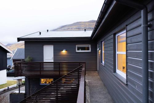 Bright Hillside House with Views in Klaksvík
