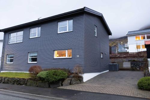 Bright Hillside House with Views in Klaksvík