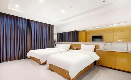 Chambre avec 2 lits