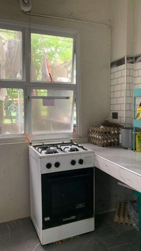 Kitchen, Shella Home Stay in Guimbal