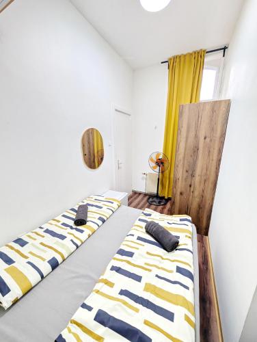 Spacious Rooms - 15 Min from Airport & City Center, 5 Min from Vienna Main-Bus Station EZ7 in 11. kerület - Simmering