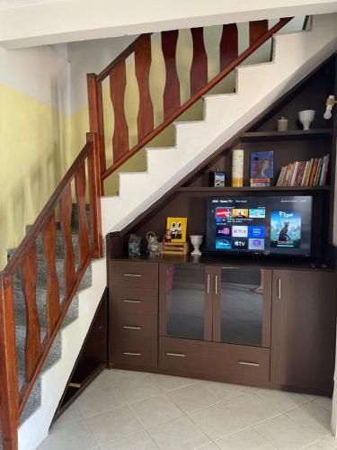 Koplietošanas atpūtas telpa ar TV, Casa Aconchego Pitanga in Kačoeira Paulista