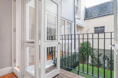 Belgravia Grand 2BR with Indoor Fireplace & Balcony - image 12