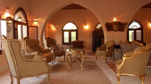 Koplietošanas atpūtas telpa ar TV, Shanda Lodge Desert Resort in Mut