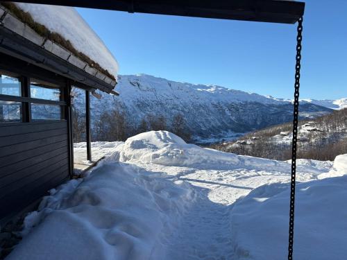 Cosy cabin in Hemsedal with ski in-ski out to Solheisen – khách sạn tại Ulsak