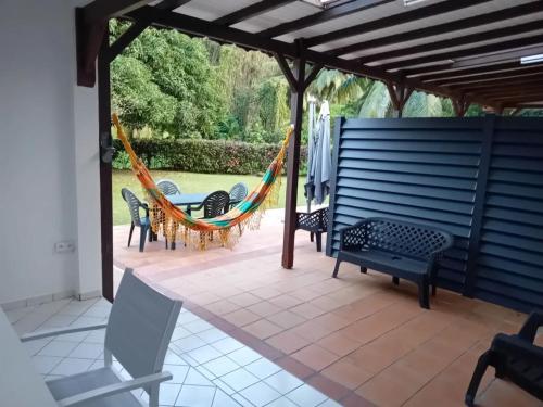 Appartement charmant à Le Gosier de 70 m² avec terrasse et jardin - Location saisonnière - Le Gosier