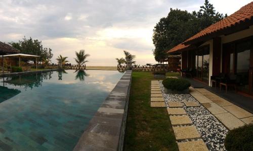 Swimming pool, Jepara Marina Beach Bungalows in Jepara Beach