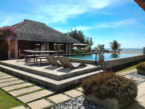 Swimming pool, Jepara Marina Beach Bungalows in Jepara Beach