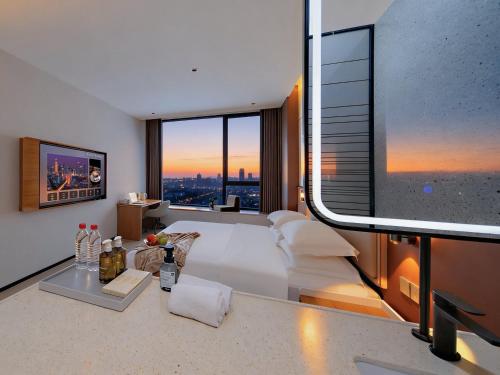 Exterior view of Leaf Hotel Qingdao Golden Sand Beach