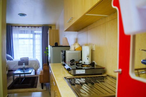 ห้องครัว, Luxury Stays near Two Rivers Mall Ruaka in รูอากา