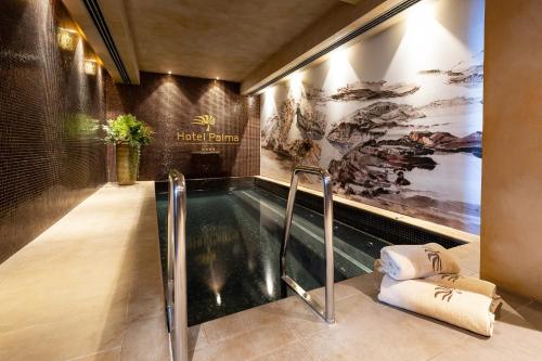 อ่างแช่น้ำร้อน, โรงแรมปาลมา (Hotel Palma) in ติวัท