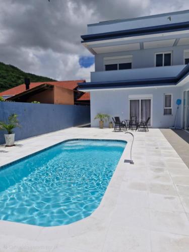 Casa de praia e piscina in Cachoeira do Bom Jesus