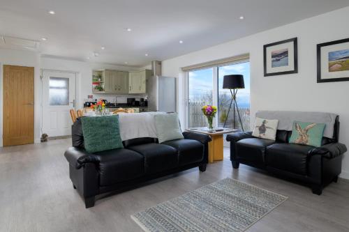 Koplietošanas atpūtas telpa ar TV, Finest Retreats - Hedd Wen Cottage in Lanlifni