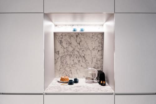 Boutique Apartment by KODA Architekt - image 12