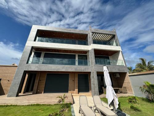OceanView Ndayane by BlueHorizons Homes - Villa pieds dans l'eau, piscine in Ndayane