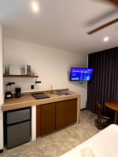 Patogumai, Balam Suites in Plaja del Karmen