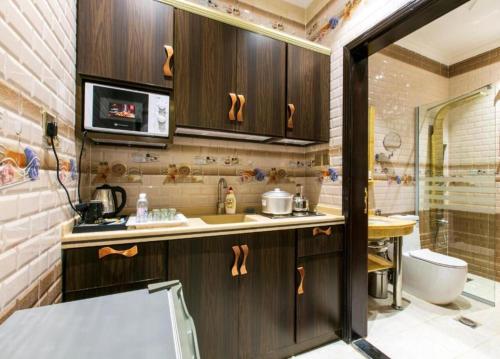 مطبخ, لامبرت للشقق الفندقية (Lambert ApartHotel) in المروة
