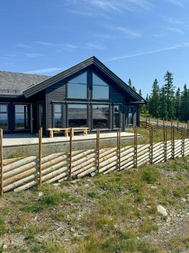 Exterior view, Modern Cottage With Outdoor Sauna By Nord-Mesna in Sjusjoen
