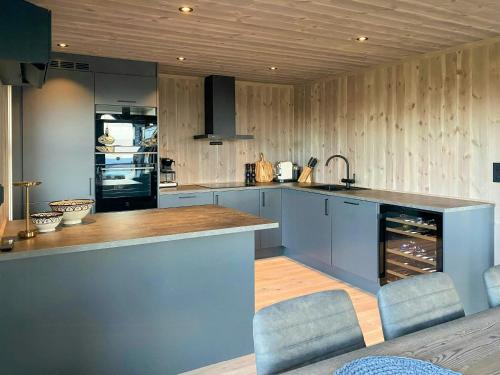 Exterior view, Modern Cottage With Outdoor Sauna By Nord-Mesna in Sjusjoen