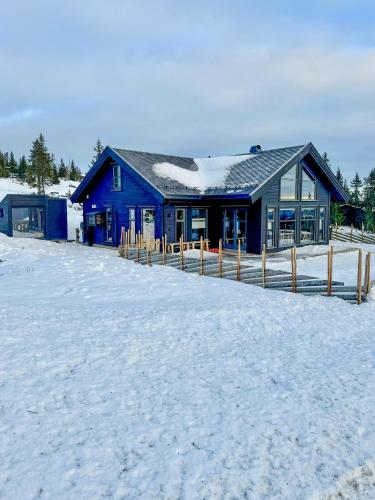 Exterior view, Modern Cottage With Outdoor Sauna By Nord-Mesna in Sjusjoen