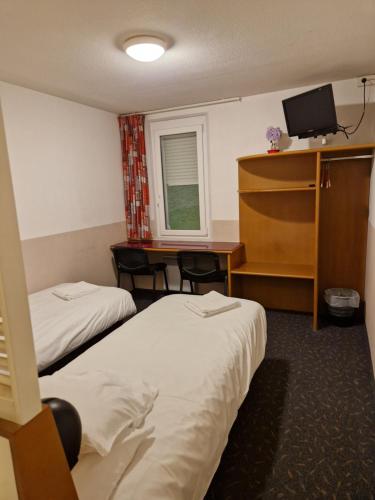 Chambre avec 2 lits