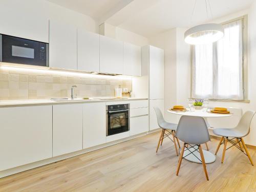 Közös társalgó / TV, Riva RealEstate - Lake Central Suite in Lecco
