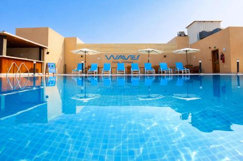 Swimmingpool, Asma Hotel in Dubai