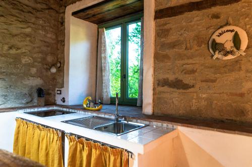 Зовнішній вигляд готелю, Romantic Apartment With Tuscan Valley Views in Лонда