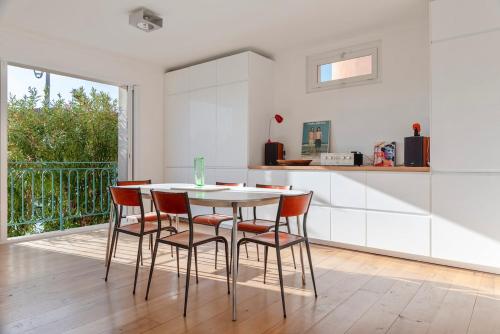 Le Ponton Appartement vue mer face au port in แซงต์ มองดรีเย ซูร์ แม