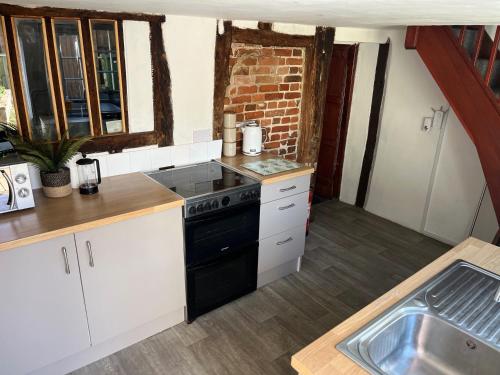 Harleston Norfolk Suffolk border Historic Cottage in 哈爾斯頓