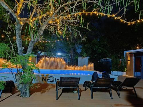 Swimming pool, NeOtel Apartments in Nai Harn Beach