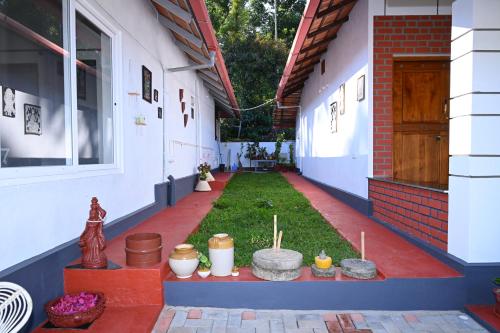 Viesnīcas āriene, Whispering Meadows By Dazzle Destinations - Coorg in Kusubur