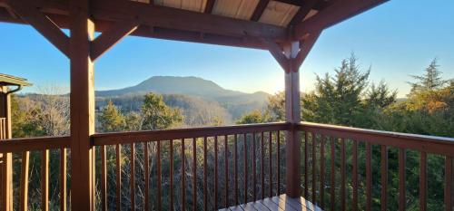 Balcony/terrace, Luxe Cabin with Game Room, Hot Tub & Firepit in Pigeon Forge (TN)