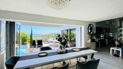 Villa Blau Beachfront Beach House in Grotto Bay Private Nature Reserve - West Coast in Grotto Bay