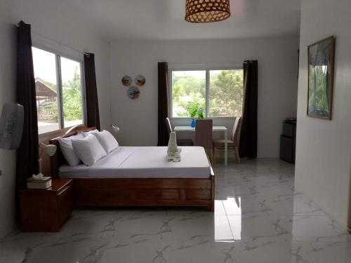 Marquis gardenland and guest house in Loay