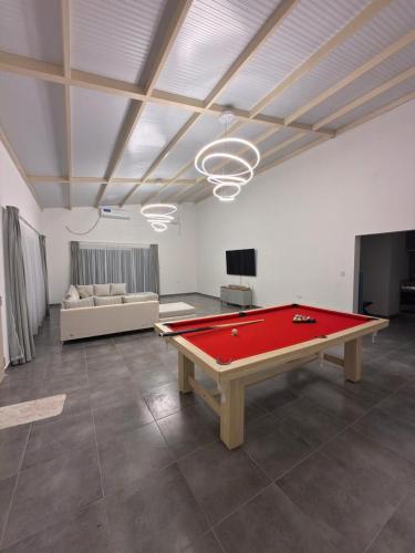 Koplietošanas atpūtas telpa ar TV, Casa Quinta Barrio Santa Lucia 3 - Laguna Brava Corrientes in Santa Ana