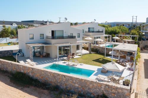Pelagia's Loft Villas Haroupi & Rodi with Private Heated Pools, 5 Walking Distance to the Beach gîte à louer Kavrós
