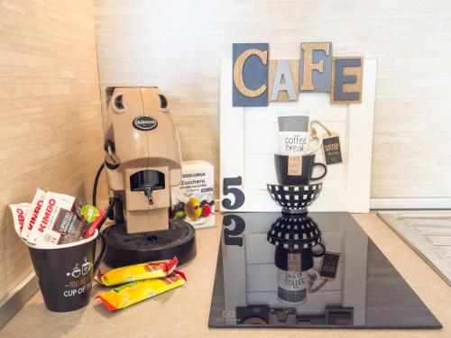 Caffèlatte (Caffelatte) in Маріна ді Піза