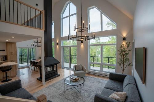 New Construction - Spa & Pool Table - Le Foresti in Saint-Alphonse-Rodriguez (QC)
